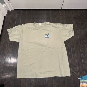 Light green/mint graphic men’s tee shirt, good quality, was barely worn.